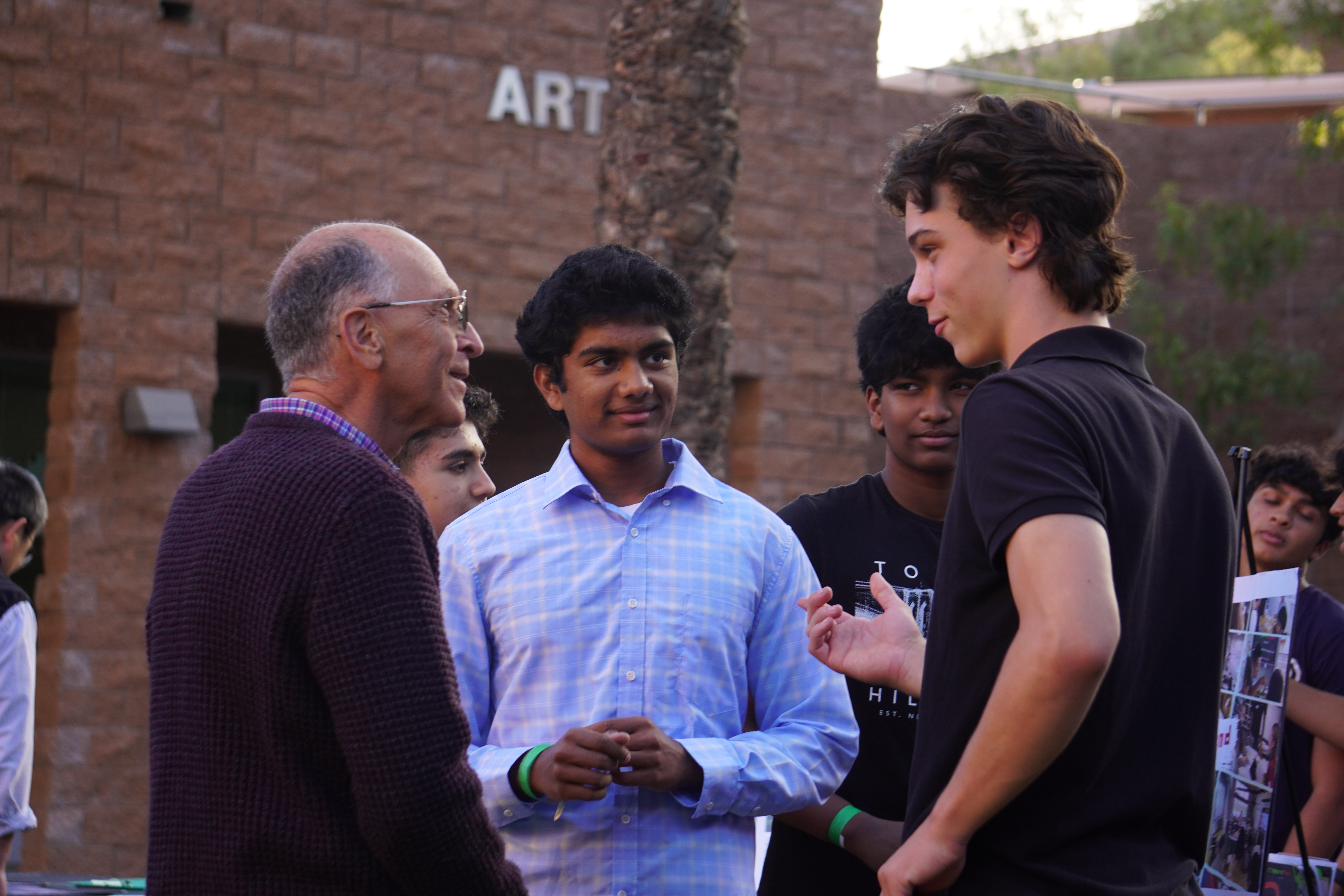 FLI founders in conversation with community partner